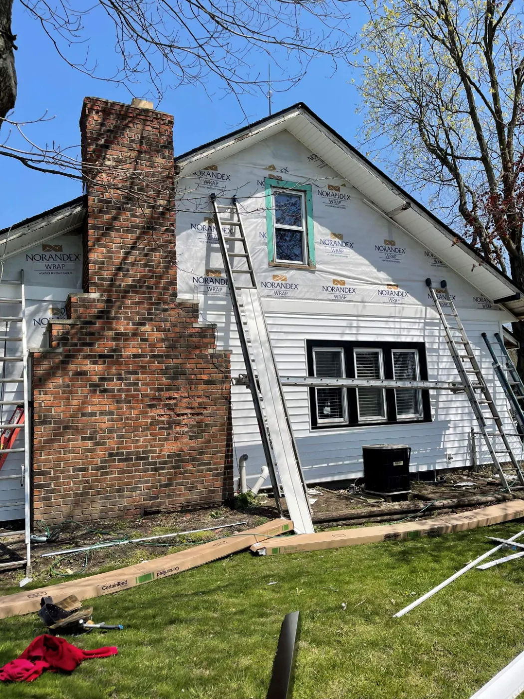 Siding installation documented in Wellington Estates